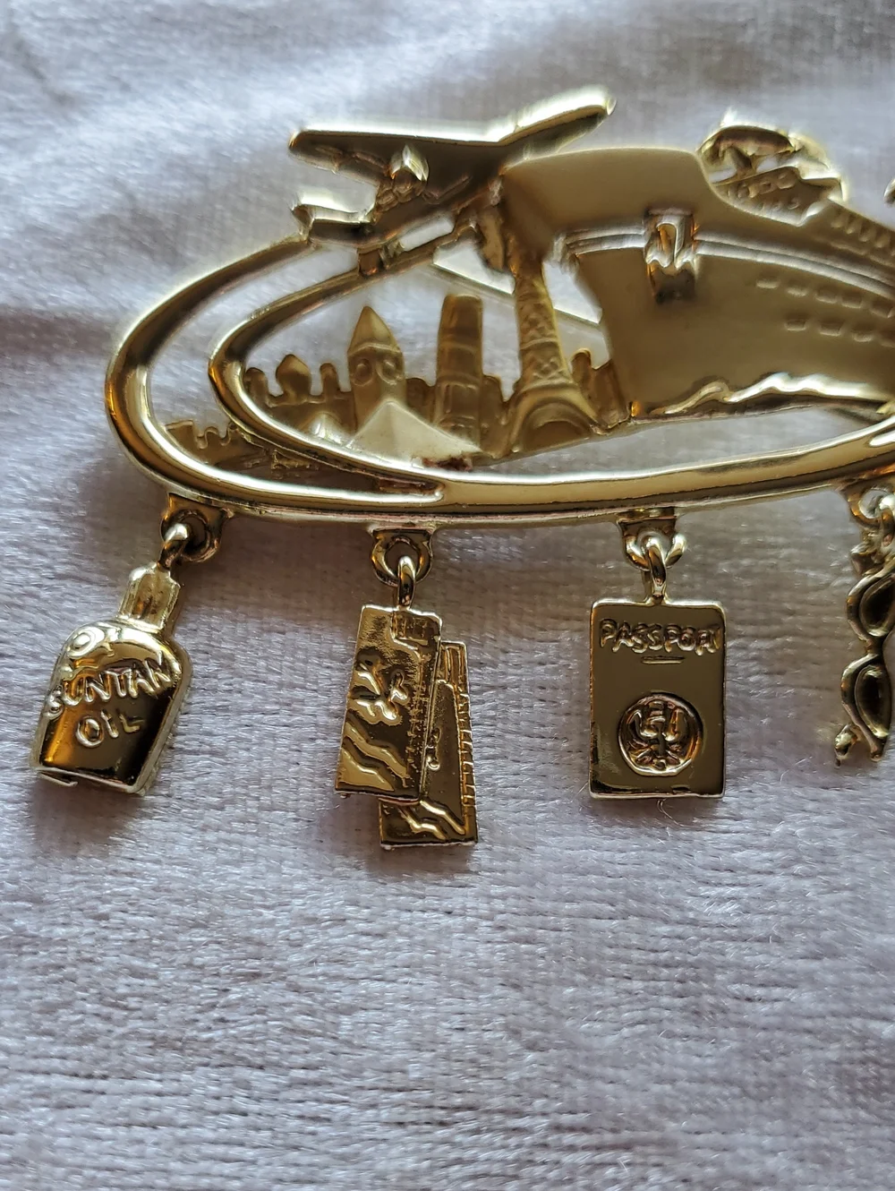 Vintage Gold Tone Cruise & Travel Charm Brooch Signed DANECRAFT
